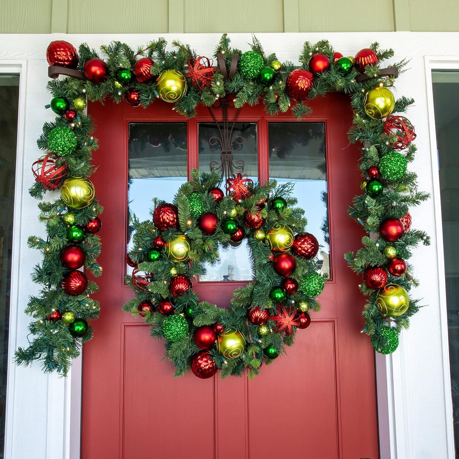 [9 Foot Artificial Christmas Garland] - Festive Holiday Collection - Red and Green Decoration - Pre Lit with 100 Warm Clear Colored LED Mini Lights - includes Remote Controlled Battery Powered Timer