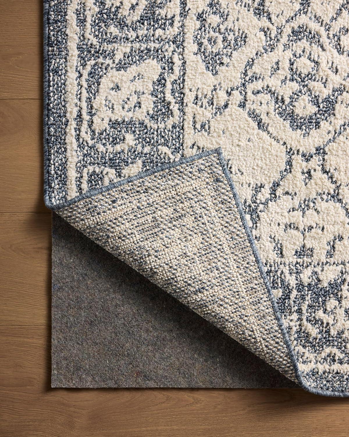 Magnolia Home by Joanna Gaines Gigi Ivory / Blue Area Rug