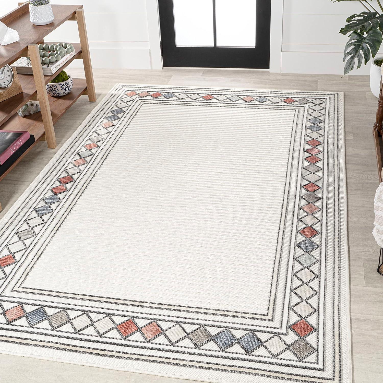 Ivory and Beige Geometric Border 4' x 6' Synthetic Area Rug