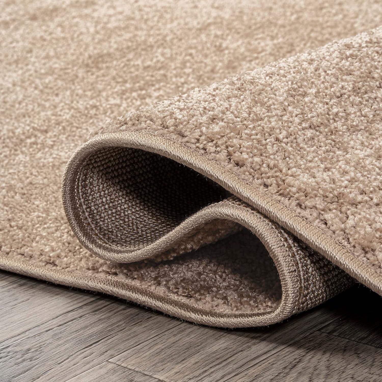 8'x10' Haze Solid Low-Pile Area Rug, Beige - JONATHAN Y