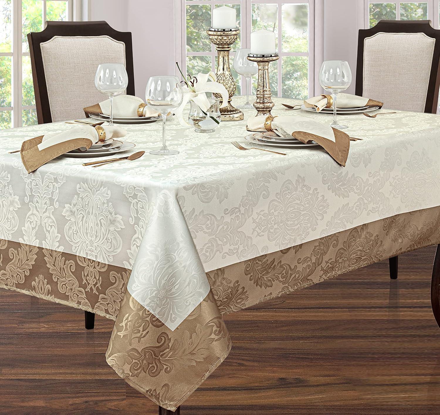 Newbridge Valencia Two Tone Bordered Damask Fabric Tablecloth, Wrinkle and Stain Resistant Fine Dining Holiday Hotel Quality Tablecloth, 52 Inch x 70 Inch Oblong/Rectangle, Antique Ivory/Gold