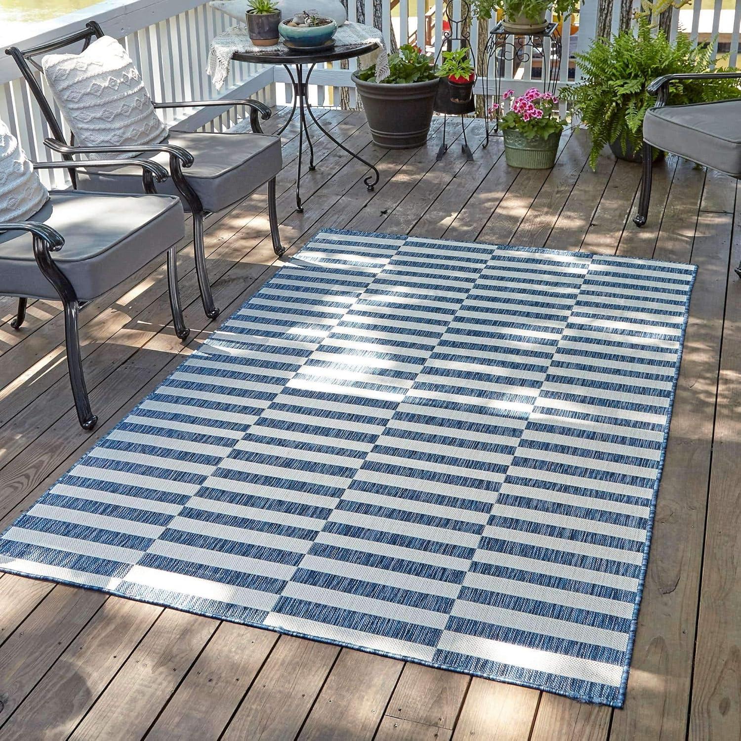 Blue and White Striped Synthetic Outdoor Rug 4' x 6'