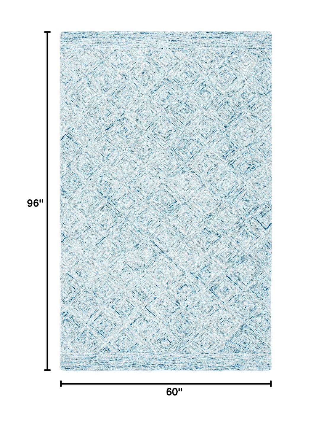 Ikat IKT704 Hand Tufted Area Rug - Blue - 5'x8' - Safavieh.