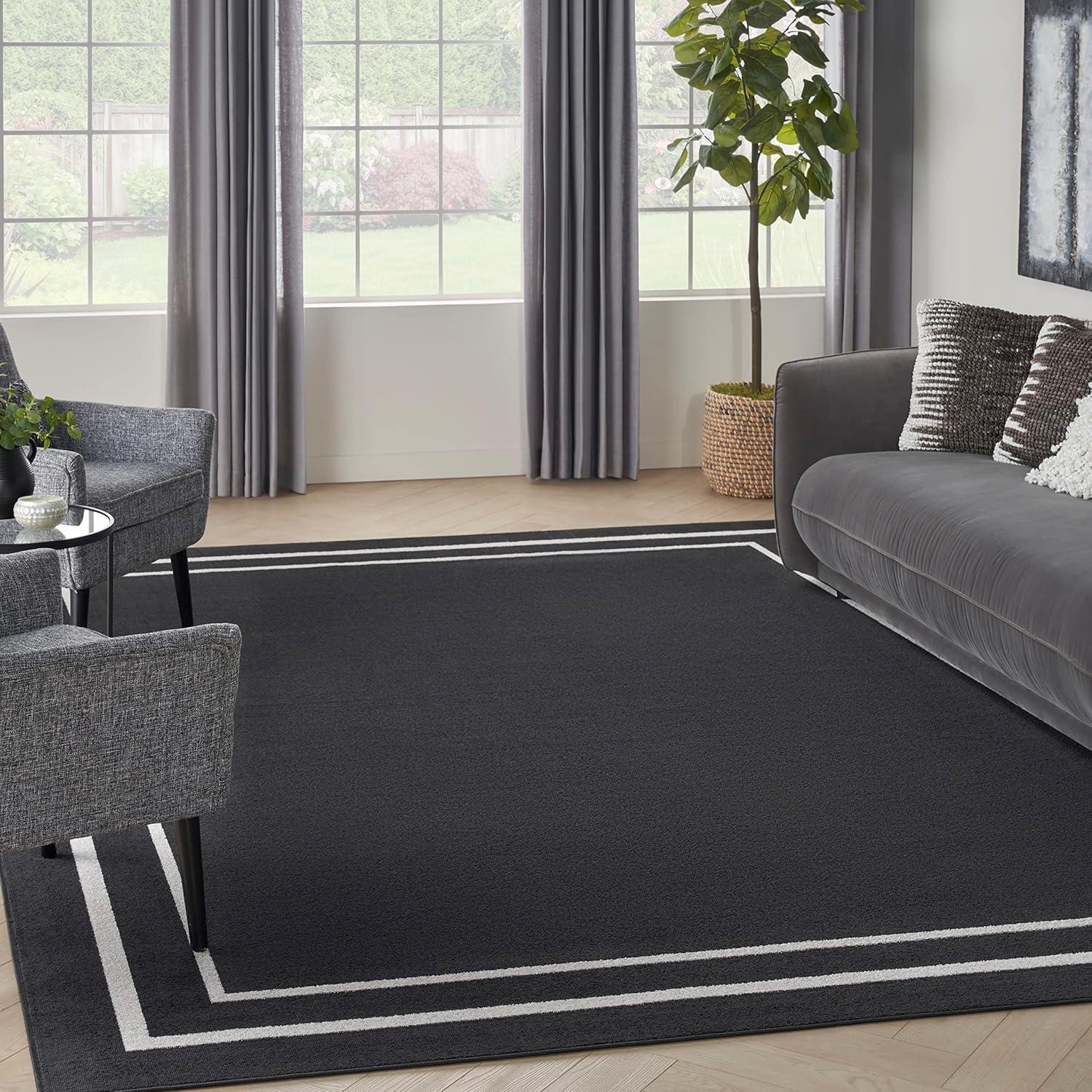 Nourison Essentials 9' x 12' Black Ivory Contemporary Indoor/Outdoor Rug