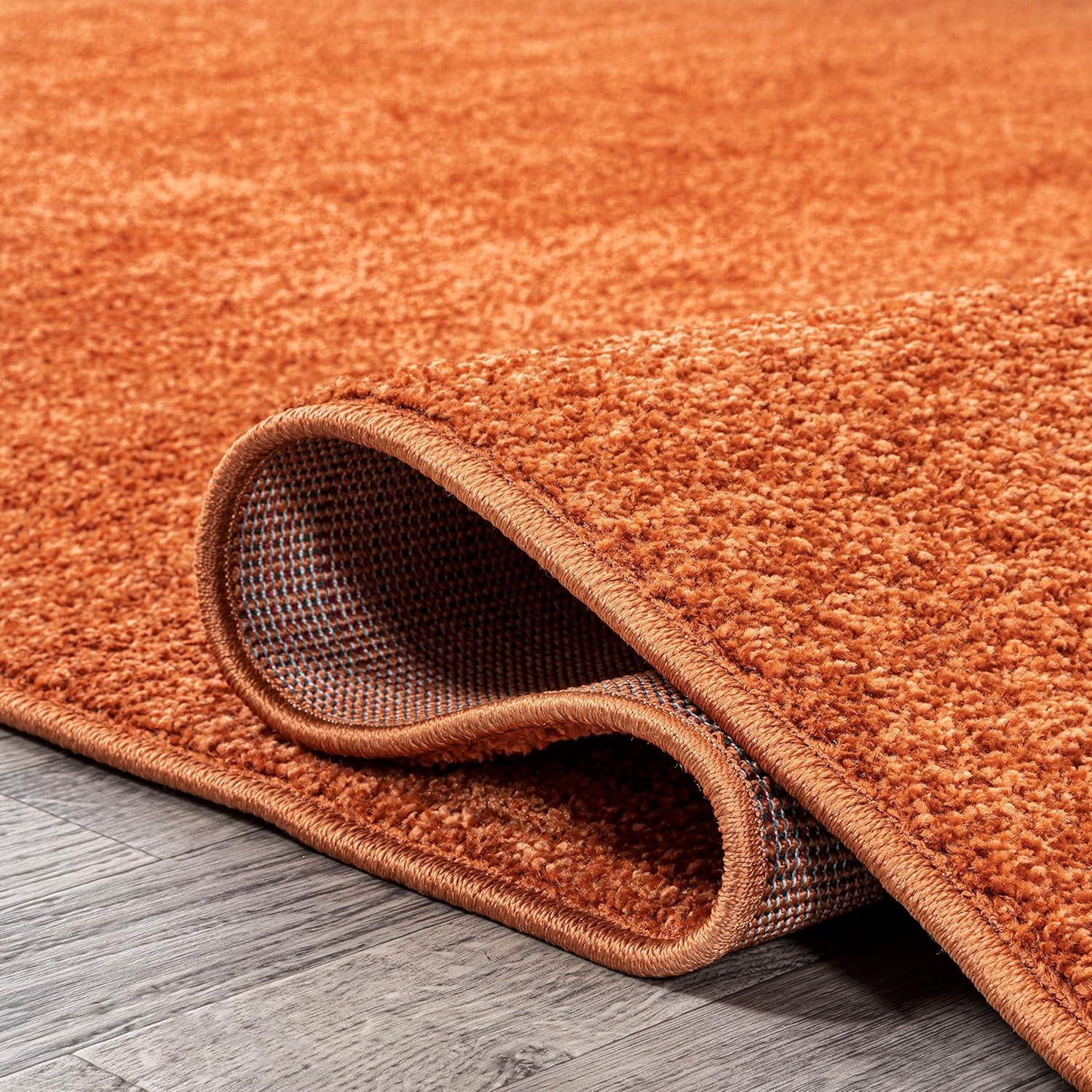 Haze Solid Low-Pile Orange 10 ft. x 14 ft. Area rug -JONATHAN Y