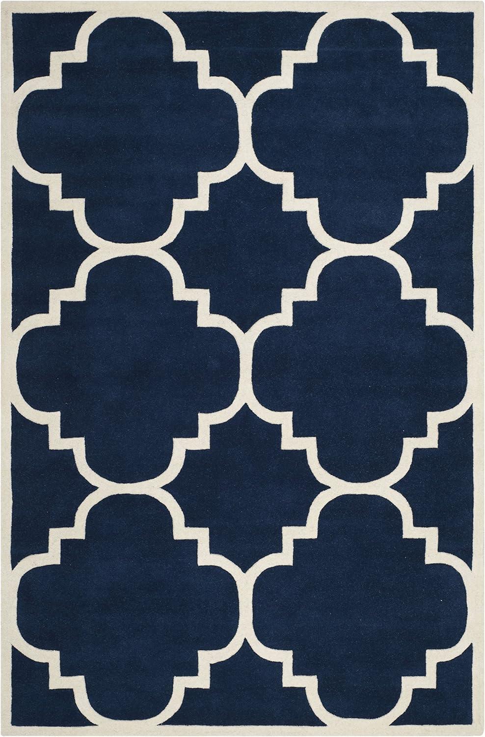 Handmade Blue and Ivory Wool 6' x 9' Geometric Area Rug