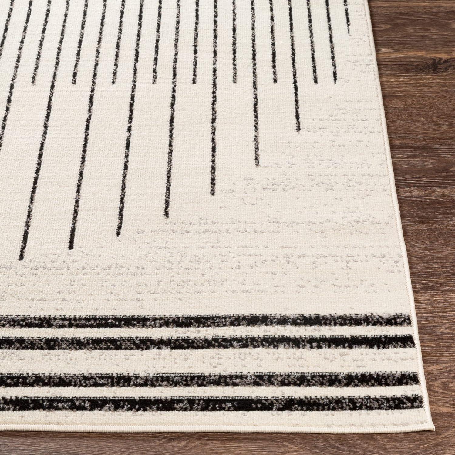 Penrod Black and Ivory Geometric 5' x 7' Area Rug