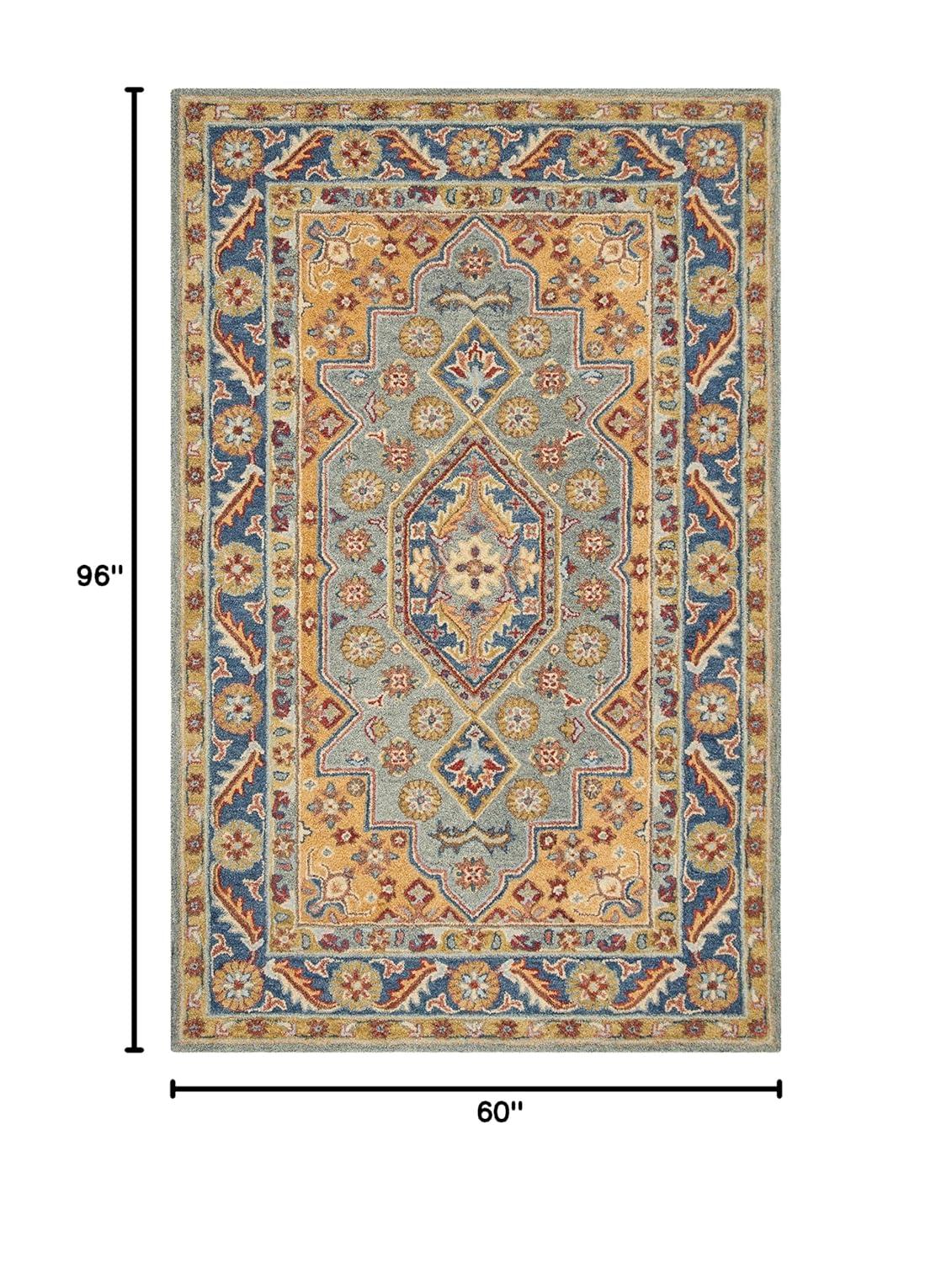Antiquity AT504 Hand Tufted Area Rug - Blue/Gold - 5'x8' - Safavieh.