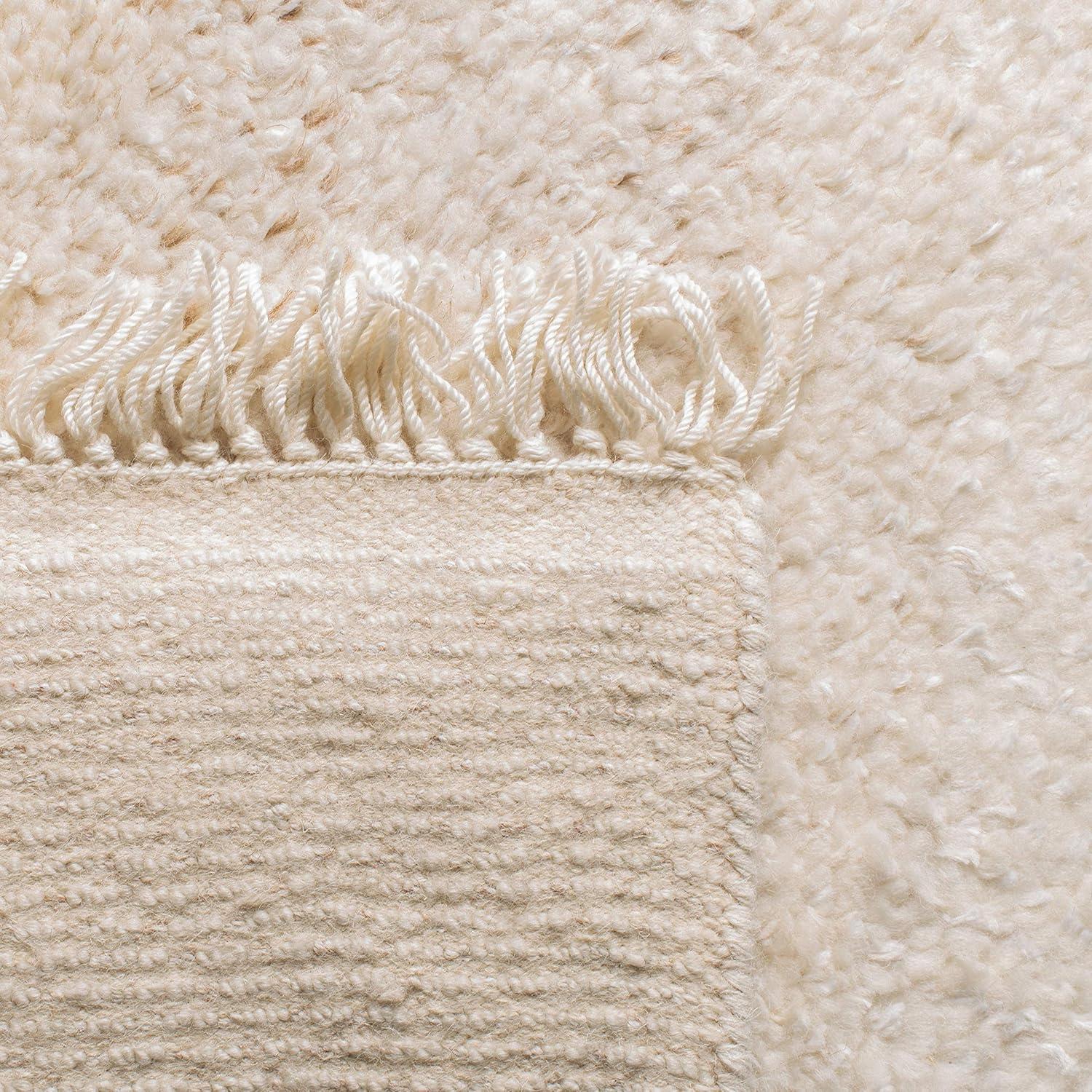 SAFAVIEH Casablanca Carbrey Solid Wool Shag Area Rug, Beige, 4' x 6'