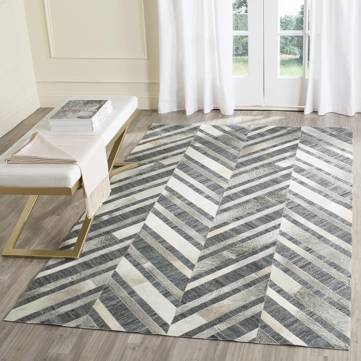 Ivory and Dark Grey Handmade Geometric Cowhide Area Rug