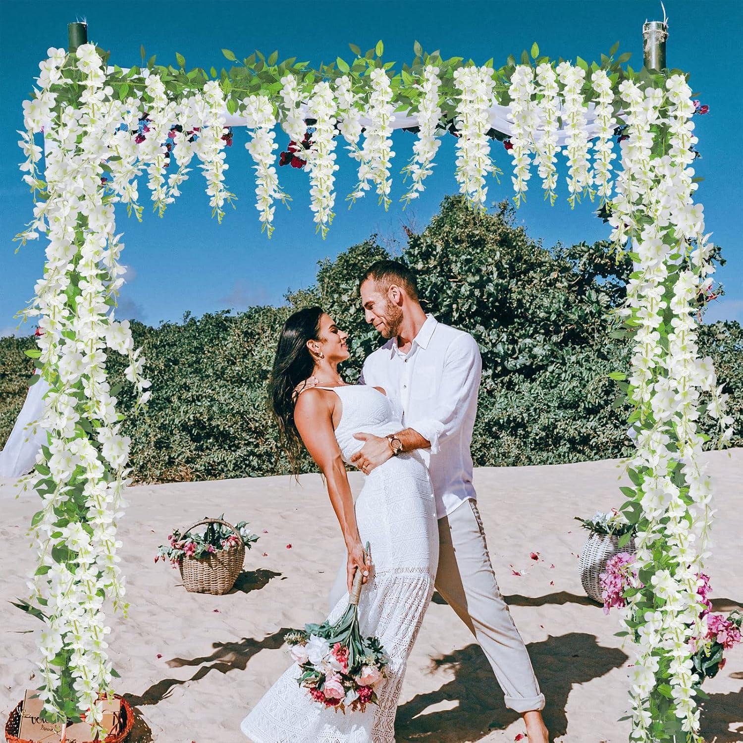 Sinhoon Wisteria Artificial Flowers Garland, 4 Pcs Total 28.8ft Artificial Wisteria Vine Silk Hanging Flower for Home Garden Outdoor Ceremony Wedding Arch Floral Decor (Light Purple)