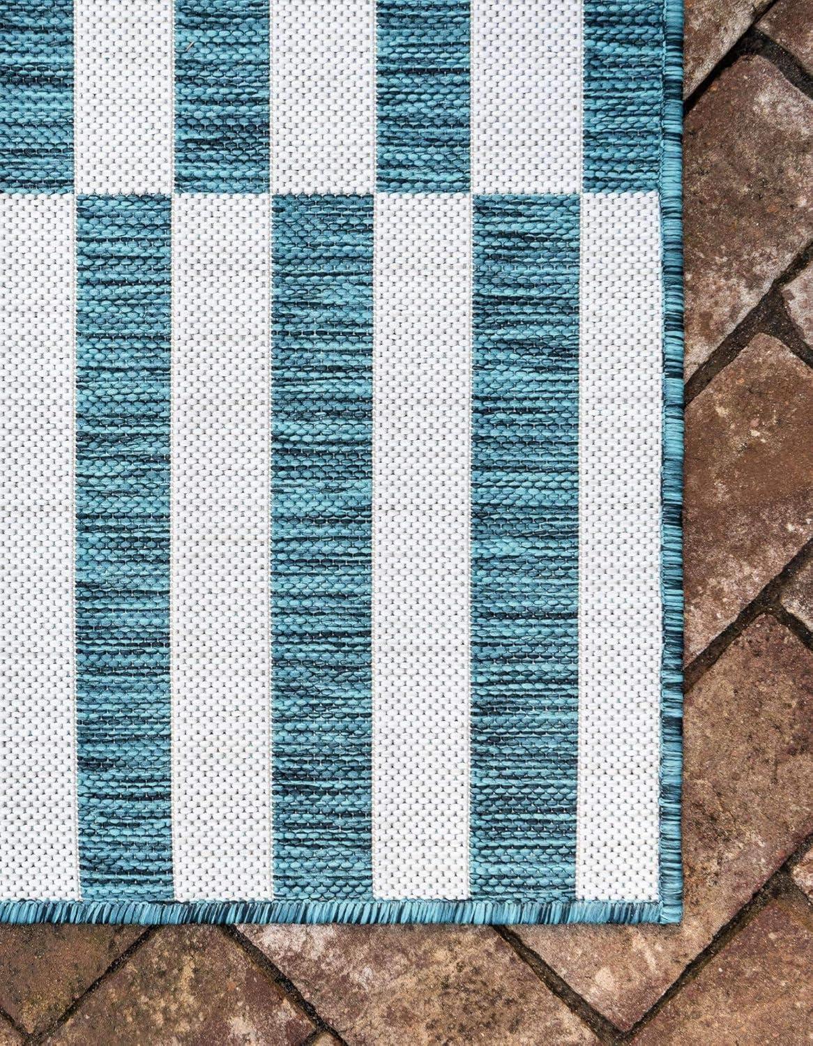 Teal and Ivory Stripe Easy-Care Outdoor Rug 5'1" x 8' Rectangular Synthetic