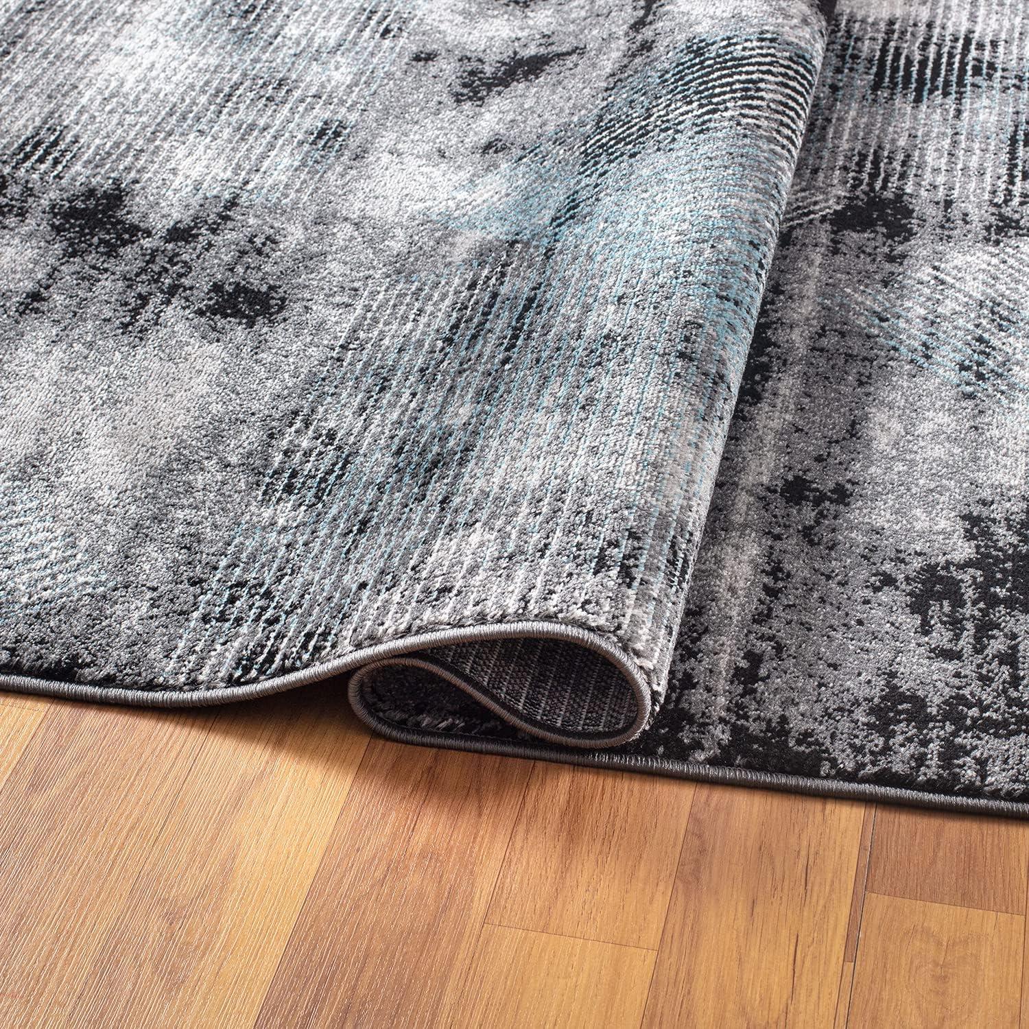 Reversible Geometric Black Synthetic 5' x 7' Area Rug