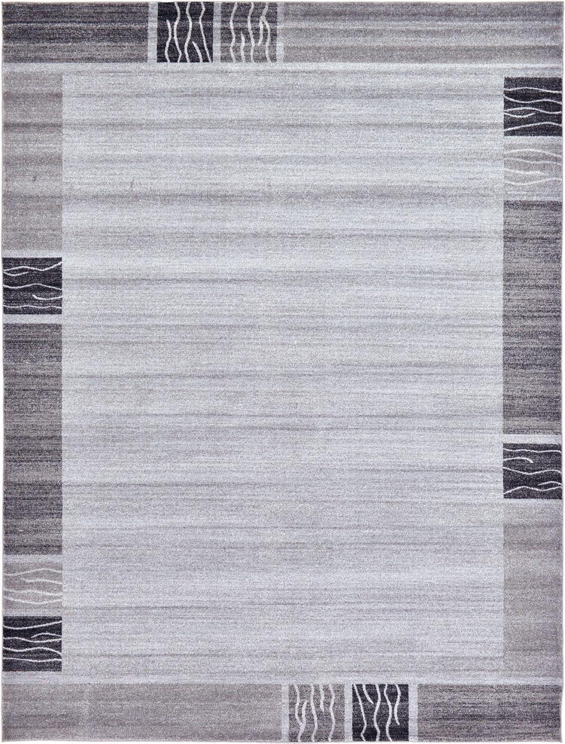 Angelica Light Gray 9' x 12' Tufted Geometric Synthetic Area Rug