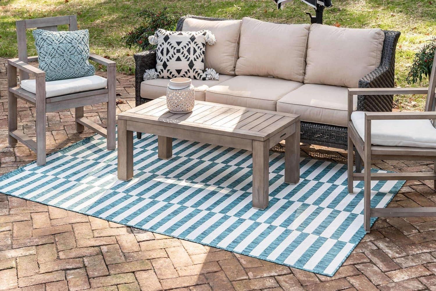 Teal and Ivory Stripe Easy-Care Outdoor Rug 5'1" x 8' Rectangular Synthetic