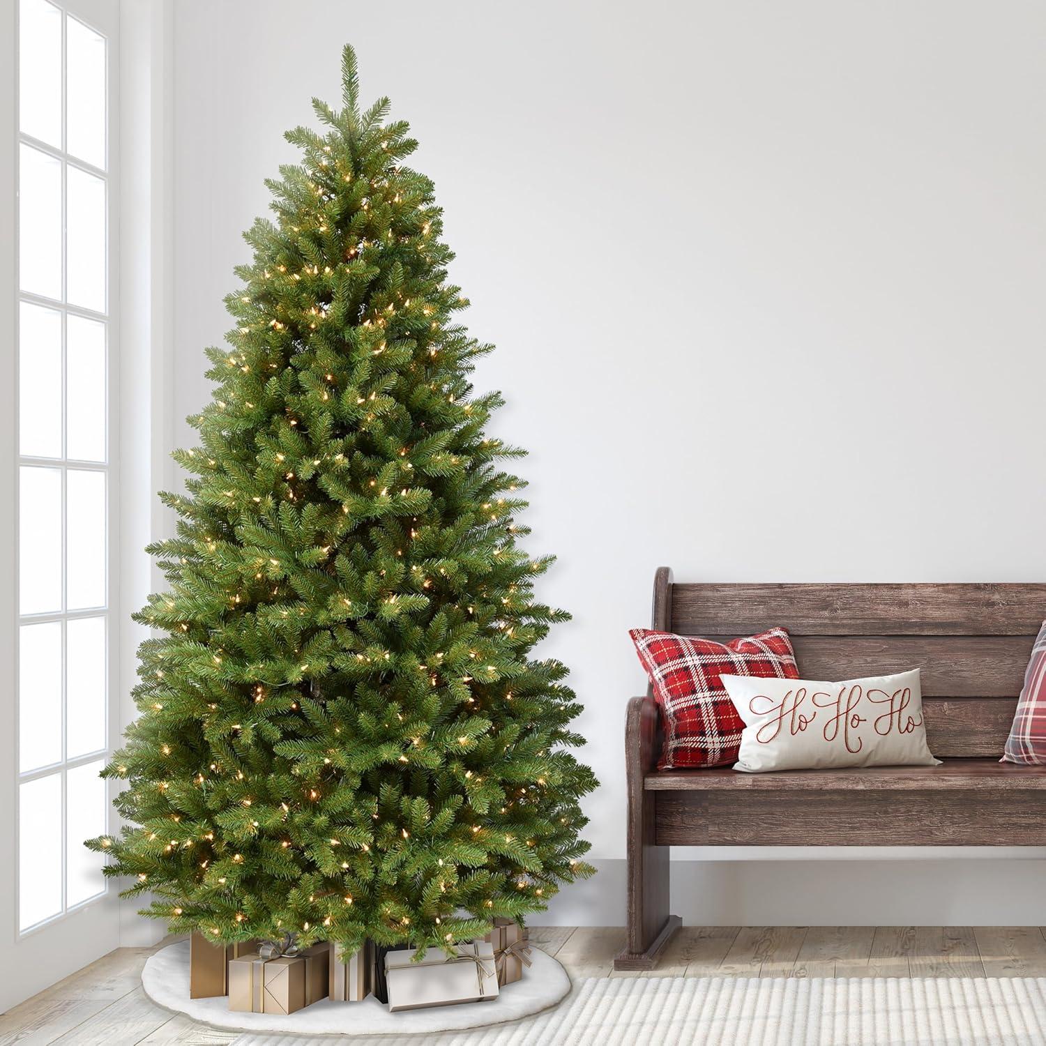 Puleo International 7.5' Pre-lit Fraser Fir Grand Tree w/ bottom row of branches near the floor Artificial Christmas Tree with 750 UL-Listed Clear Lights