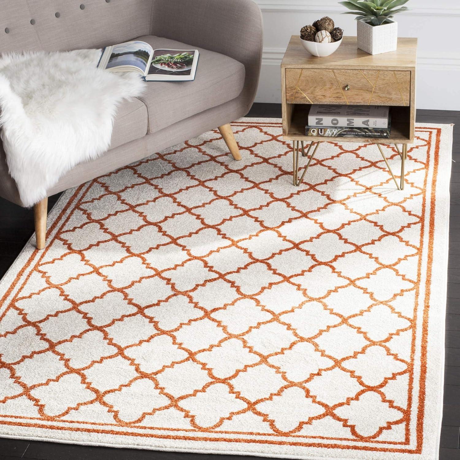 Ivory and Light Grey Geometric 5' x 8' Synthetic Area Rug