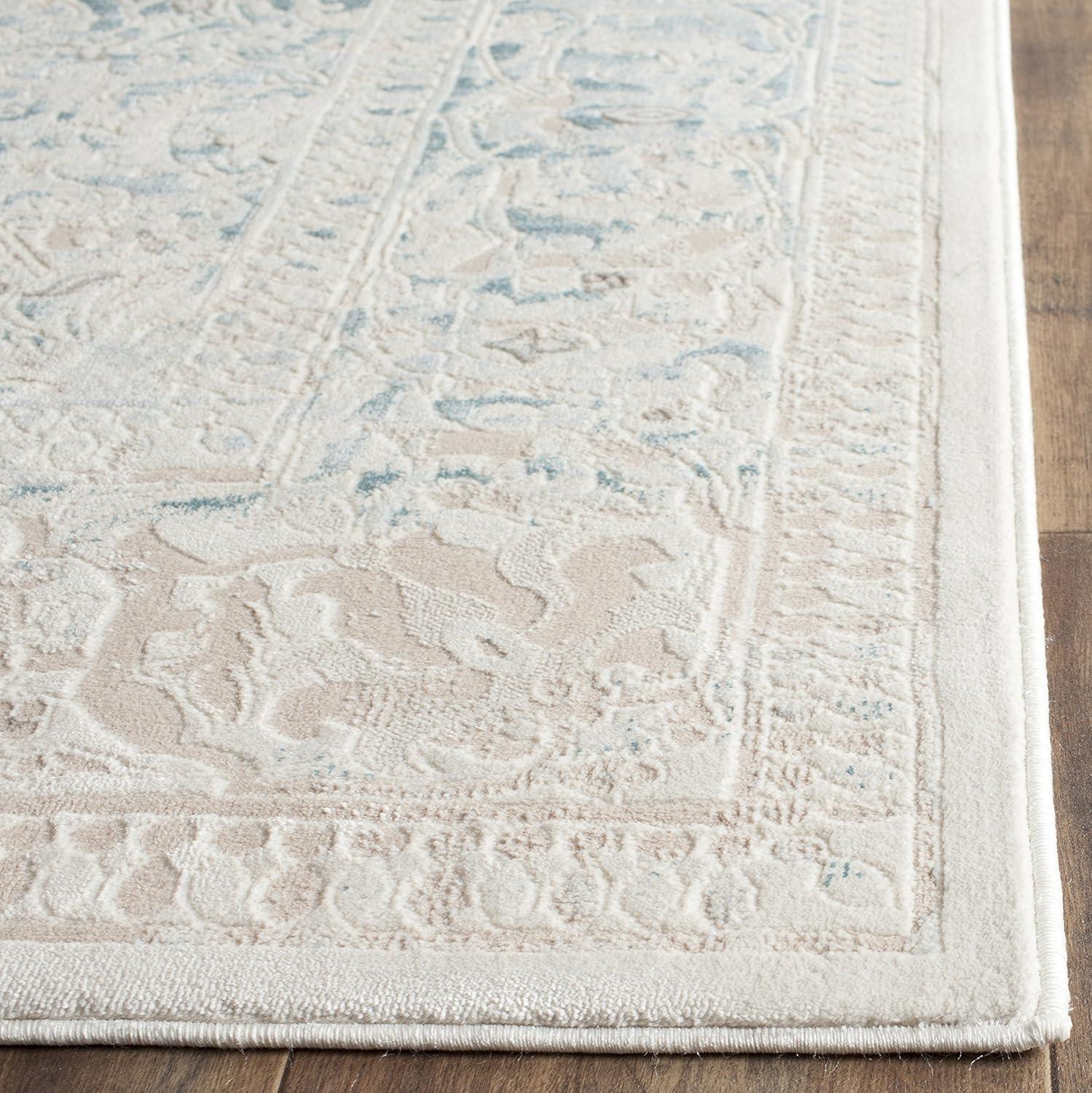 Ivory and Turquoise Rectangular Reversible Synthetic Area Rug