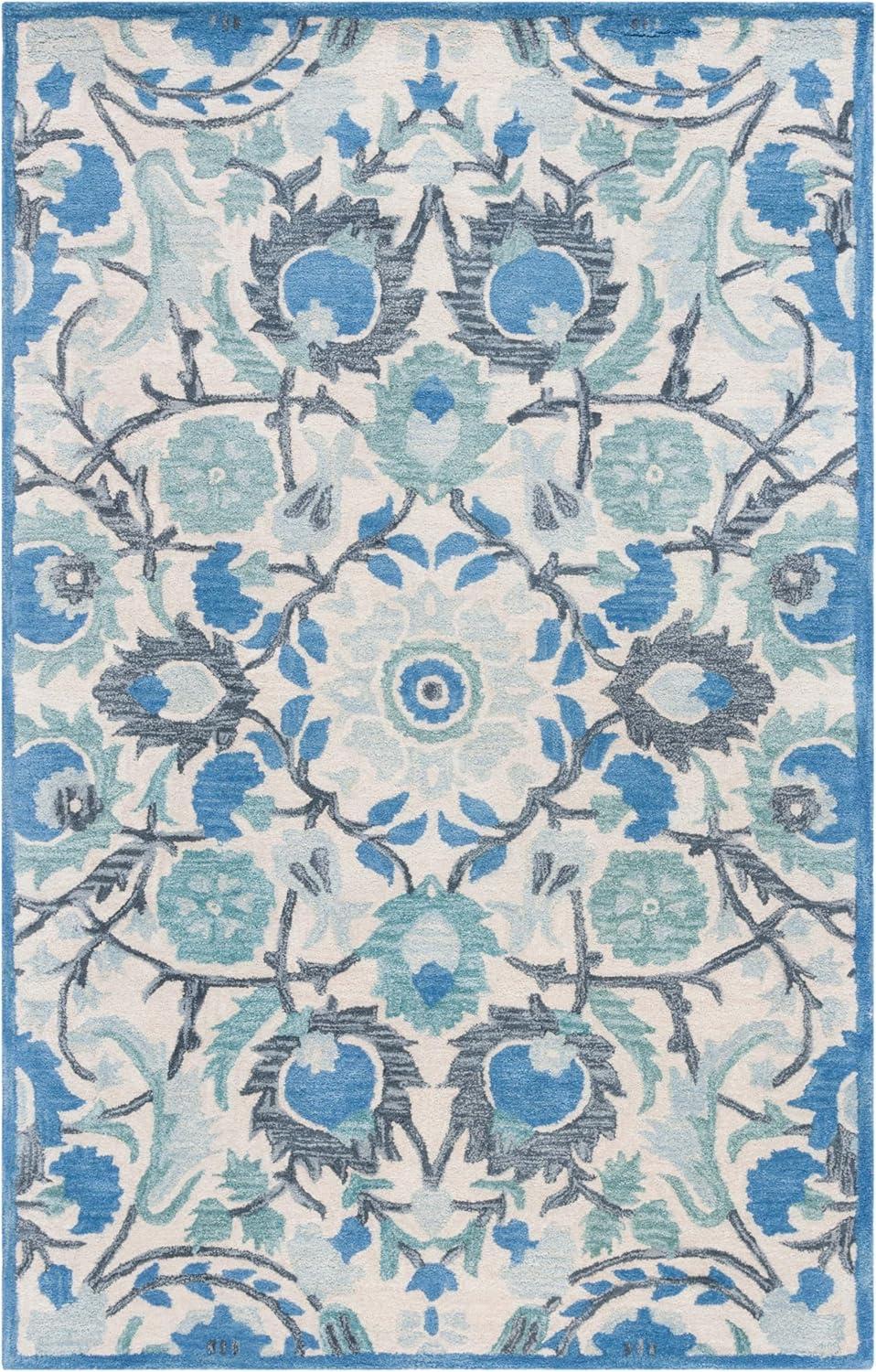 Antiquity AT59 Hand Tufted Area Rug - Ivory/Blue - 5'x8' - Safavieh.