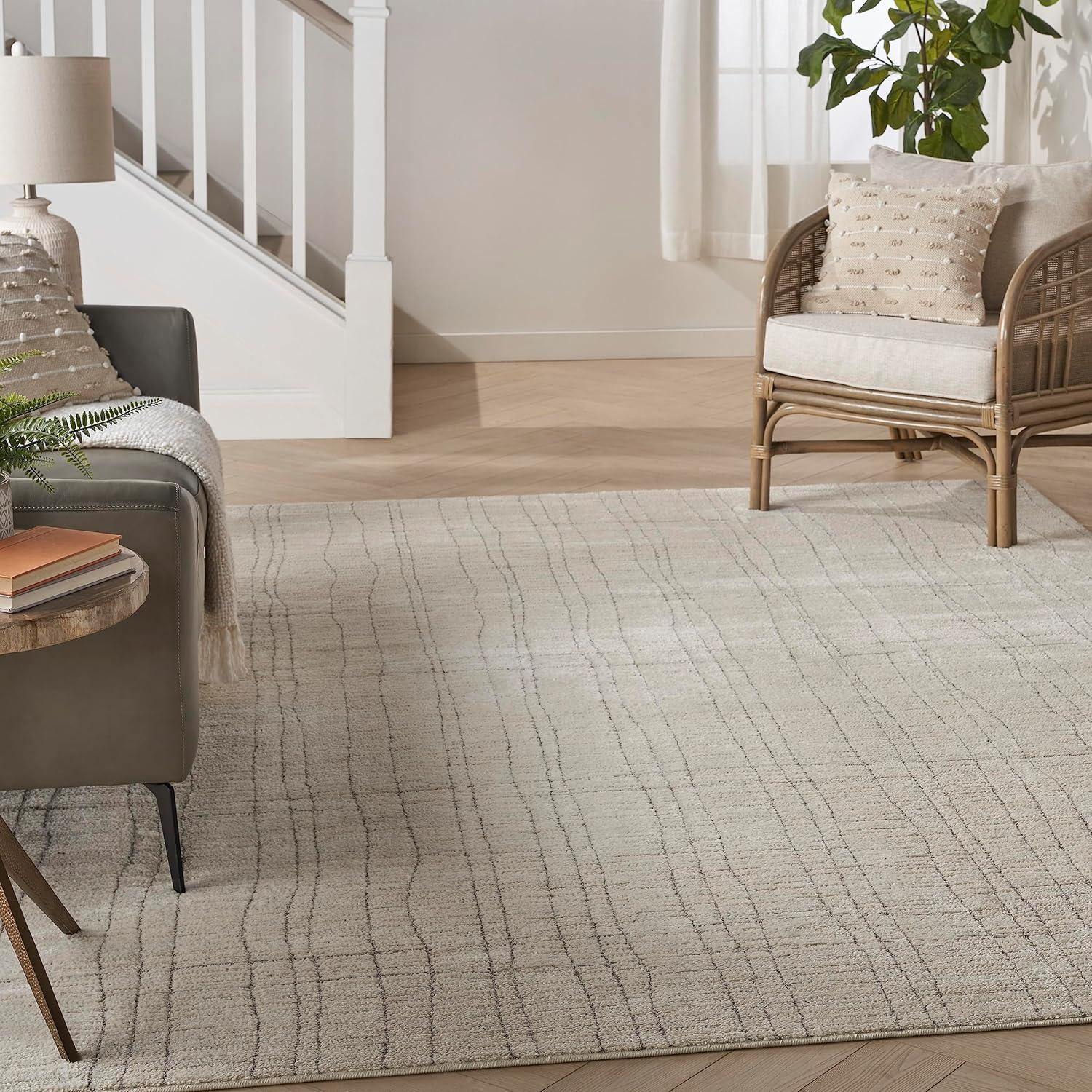 Ivory and Grey Abstract 9' x 12' Synthetic Area Rug