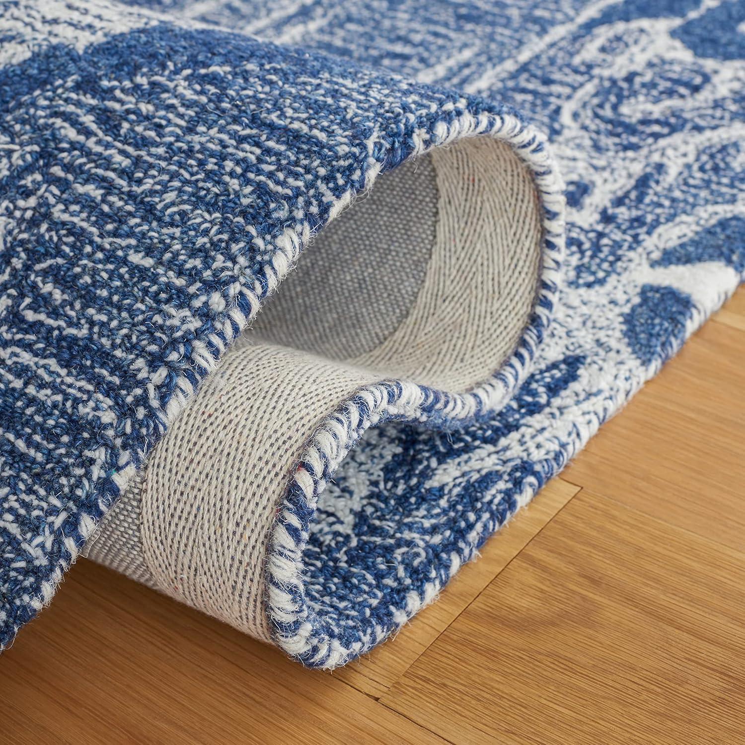 Ikat IKT654 Hand Tufted Area Rug - Blue/Ivory - 8'x10' - Safavieh.