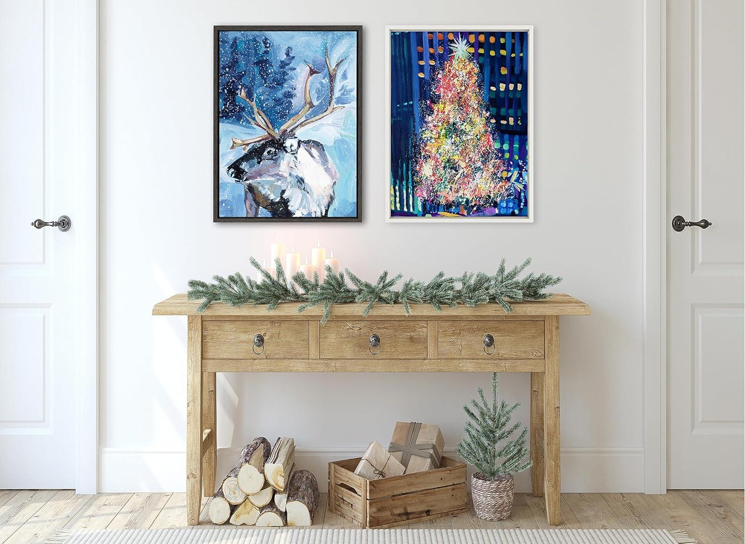 Kate & Laurel All Things Decor Sylvie Colorful Majestic Reindeer In Snow Framed Canvas Wall Art by Rachel Christopoulos