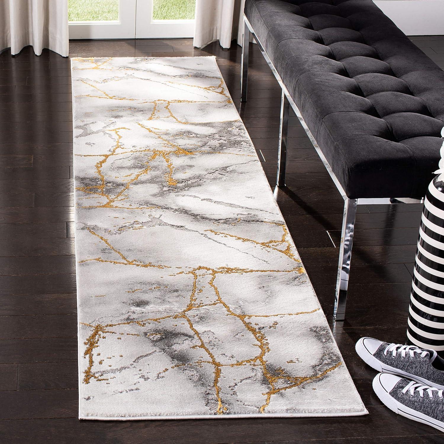 Elegant Abstract Gray and Gold 2' x 8' Synthetic Runner Rug