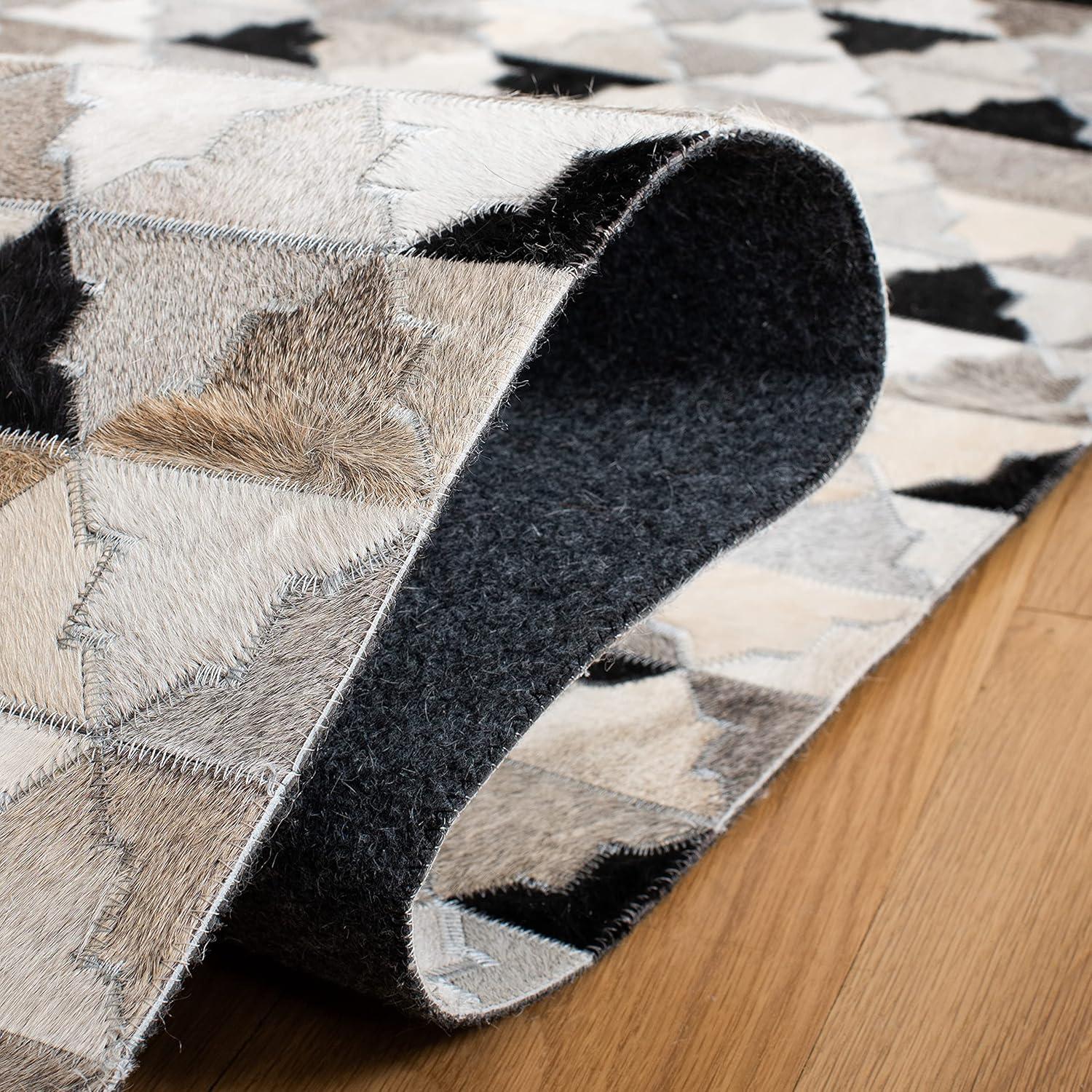 Loon Peak® Brentnal Flat Weave Hair On Leather Geometric Rug