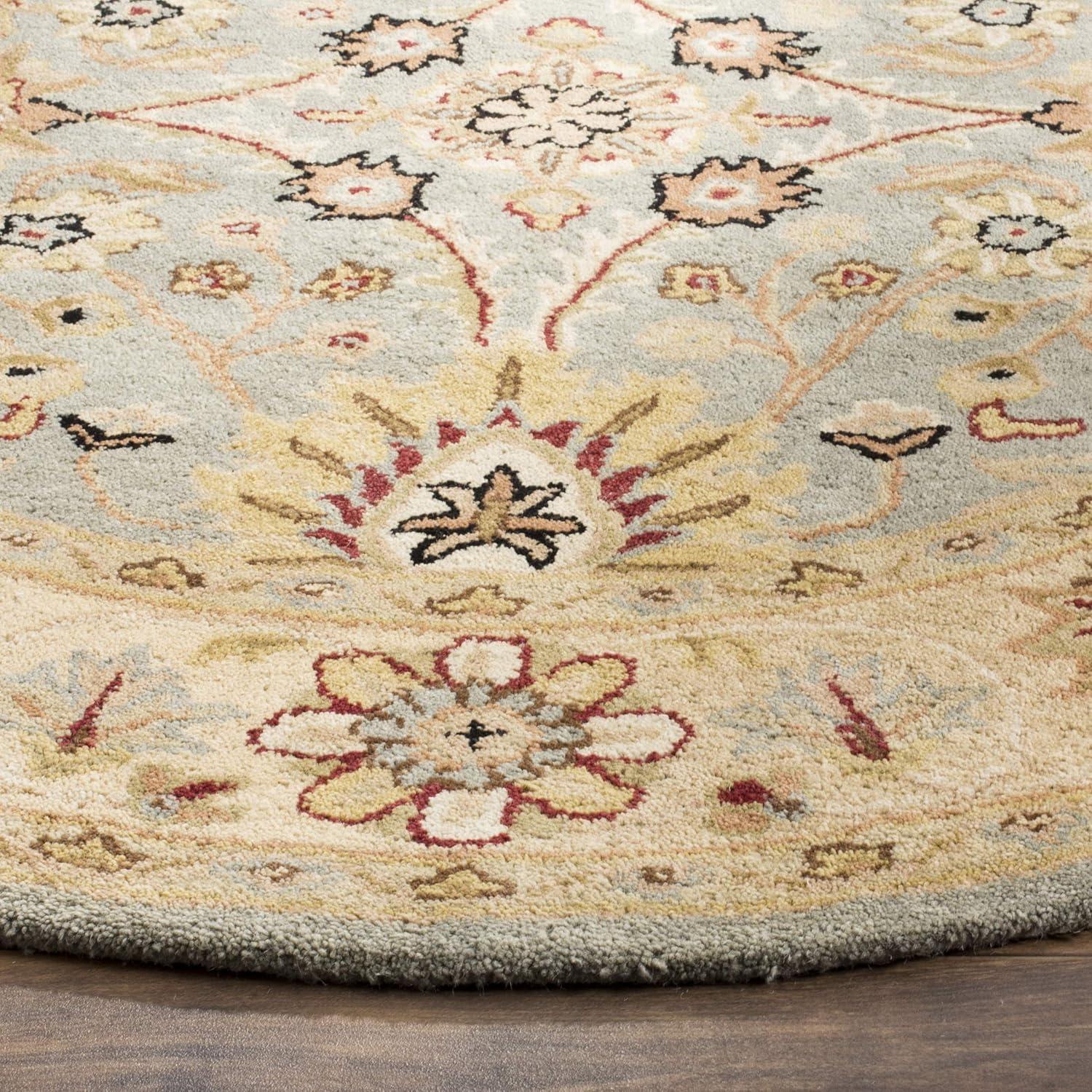 Antiquity AT249 Hand Tufted Area Rug - Light Blue/Ivory - 7'6"x9'6" Oval - Safavieh.