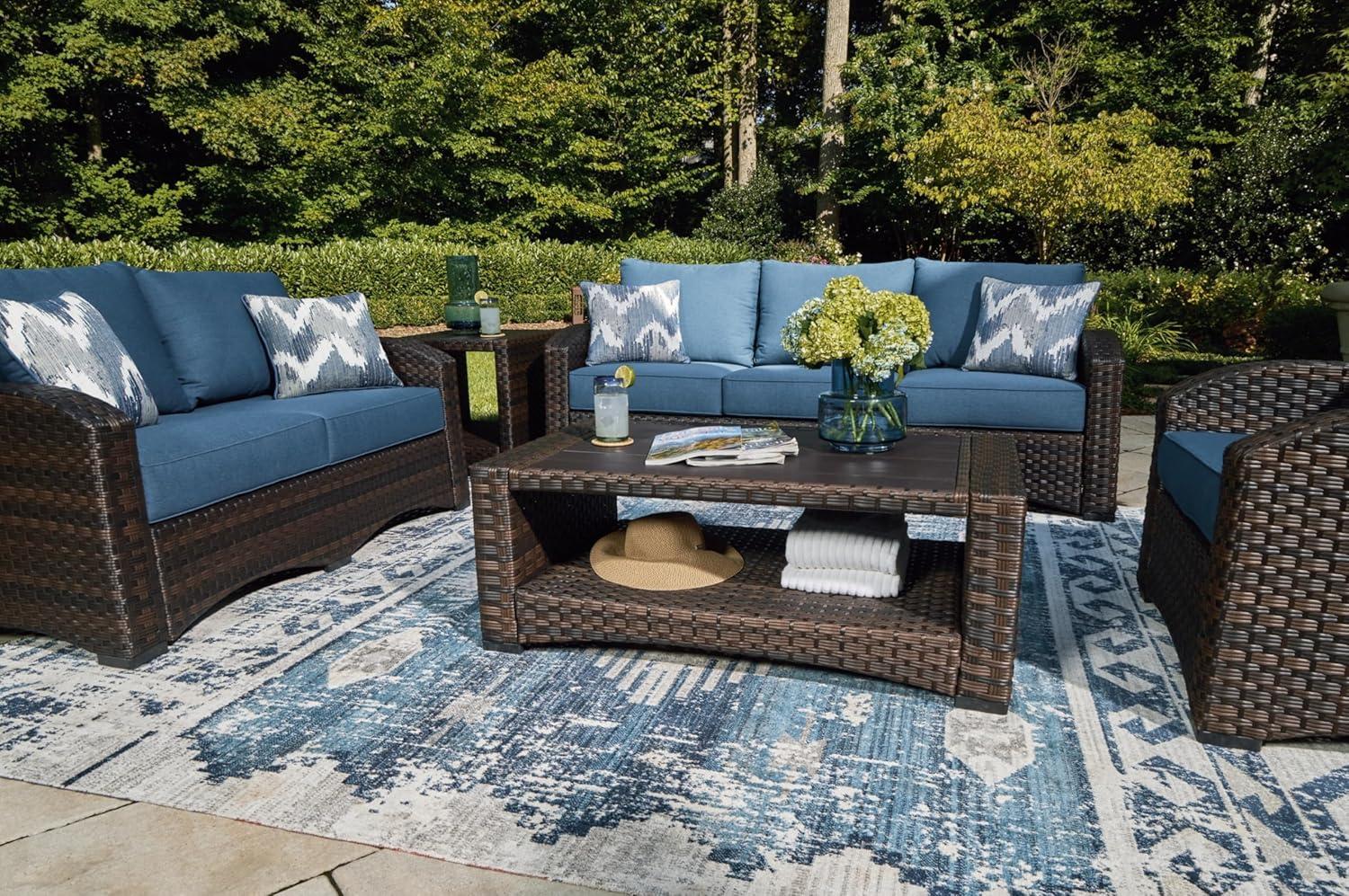 Blue and Brown Wicker Lounge Chair with Cushions