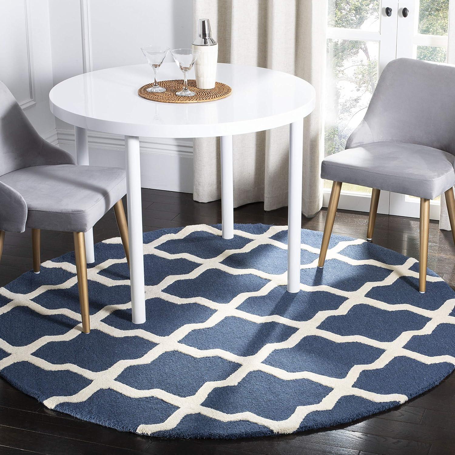 SAFAVIEH Cambridge Liam Geometric Wool Area Rug, Navy Blue/Ivory, 4' x 4' Round
