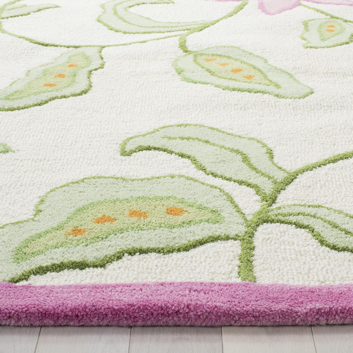 SAFAVIEH Kids Collection SFK351A Handmade Ivory/Pink Rug
