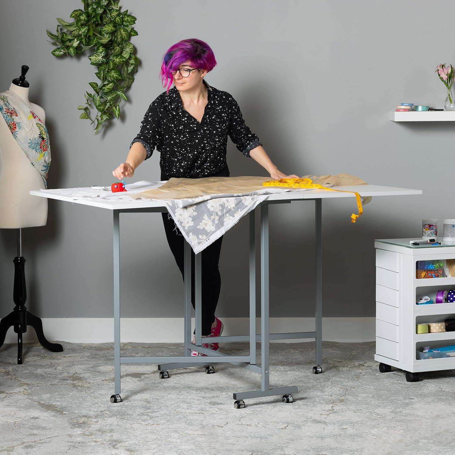 Sew Ready 58.75'' x 36.5'' Foldable Craft Table with Wheels
