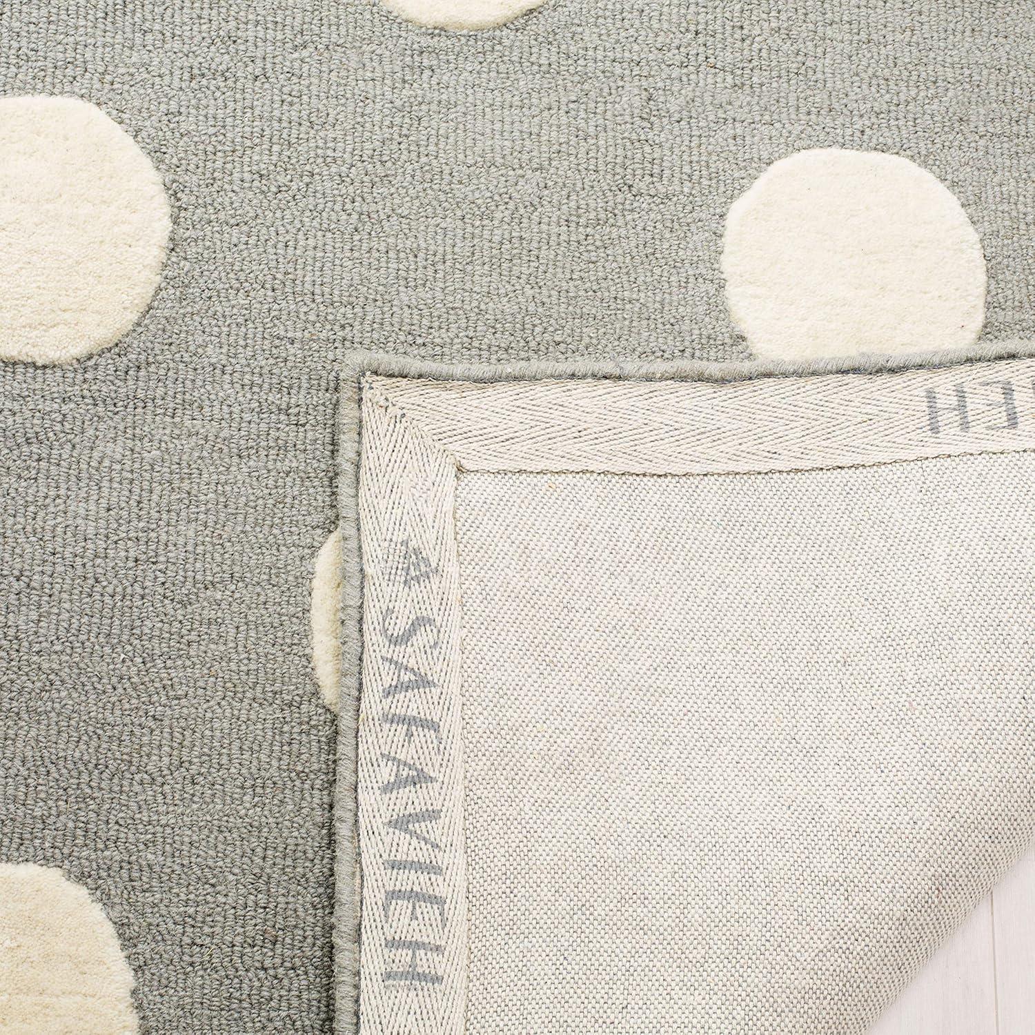 Safavieh Kids Polka Dots SFK904 Hand Tufted Indoor Area Rug - Ivory/Black - 5'x7' - Safavieh