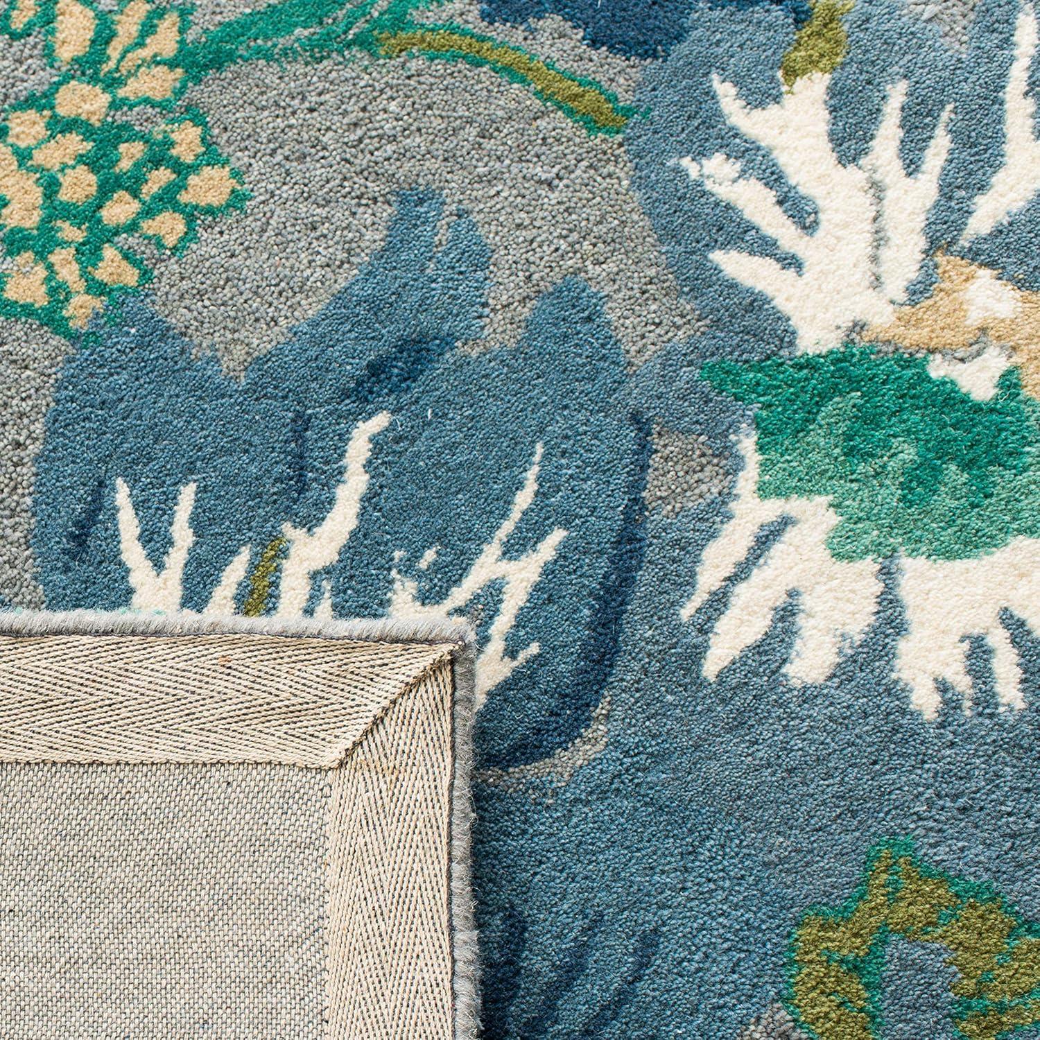 Soho SOH849 Hand Tufted Area Rug - Blue/Multi - 5'x8' - Safavieh.