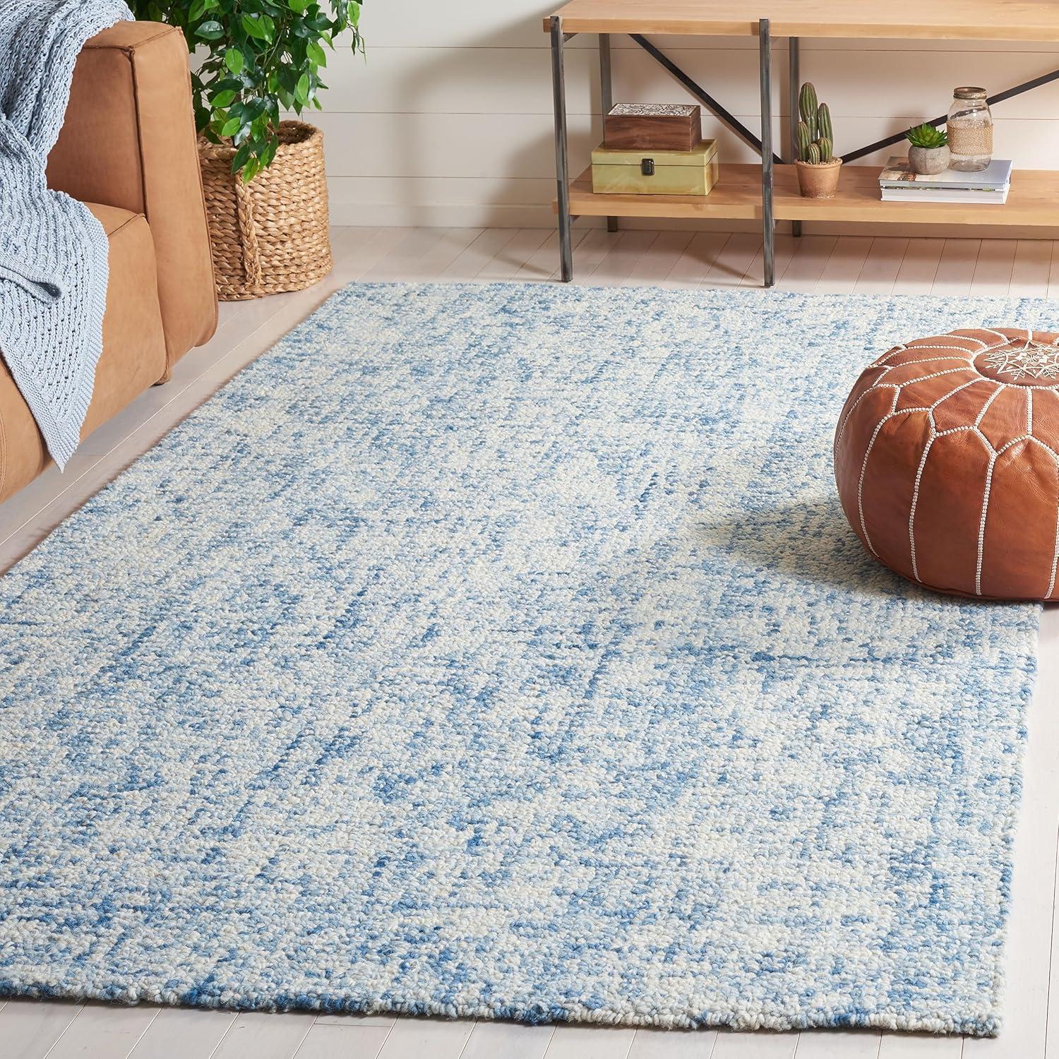 SAFAVIEH Abstract Ethelyn Solid Area Rug, Blue/Ivory, 5' x 8'