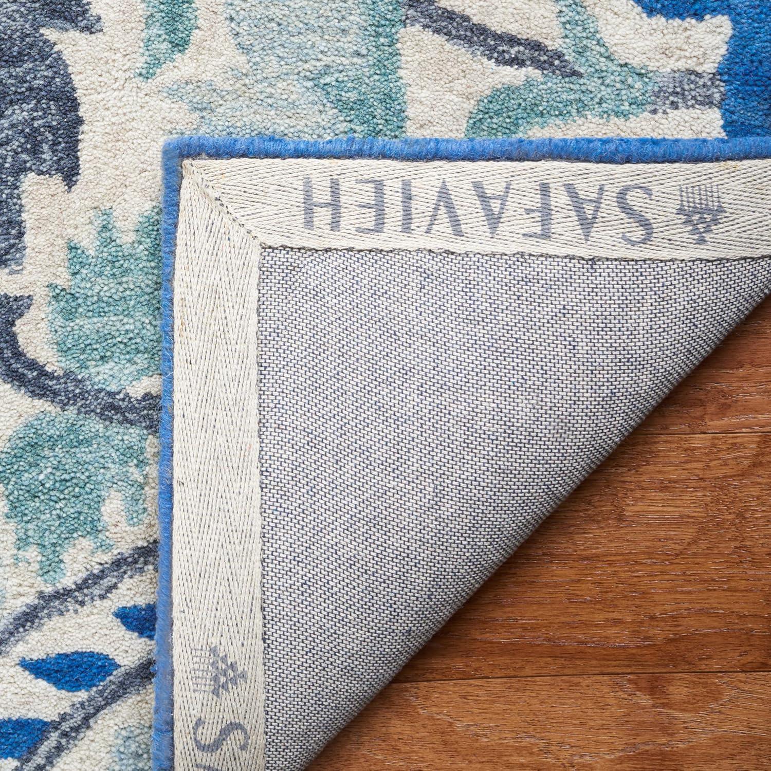 Antiquity AT59 Hand Tufted Area Rug - Ivory/Blue - 5'x8' - Safavieh.
