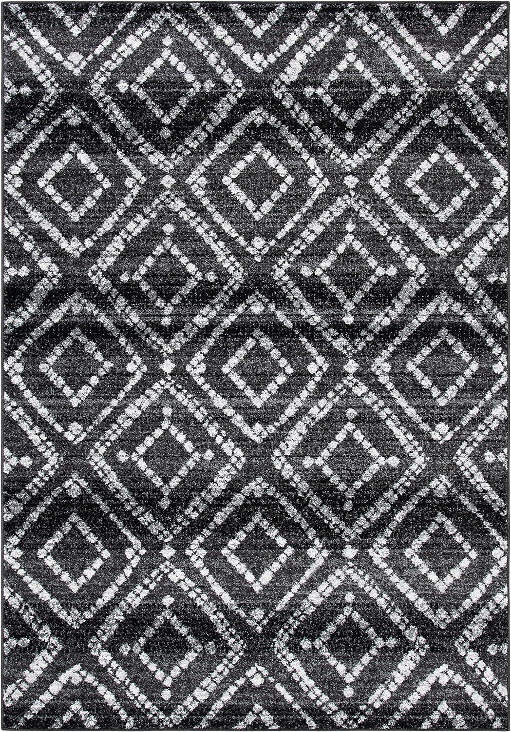 Black and Ivory Geometric Synthetic Rectangular Area Rug