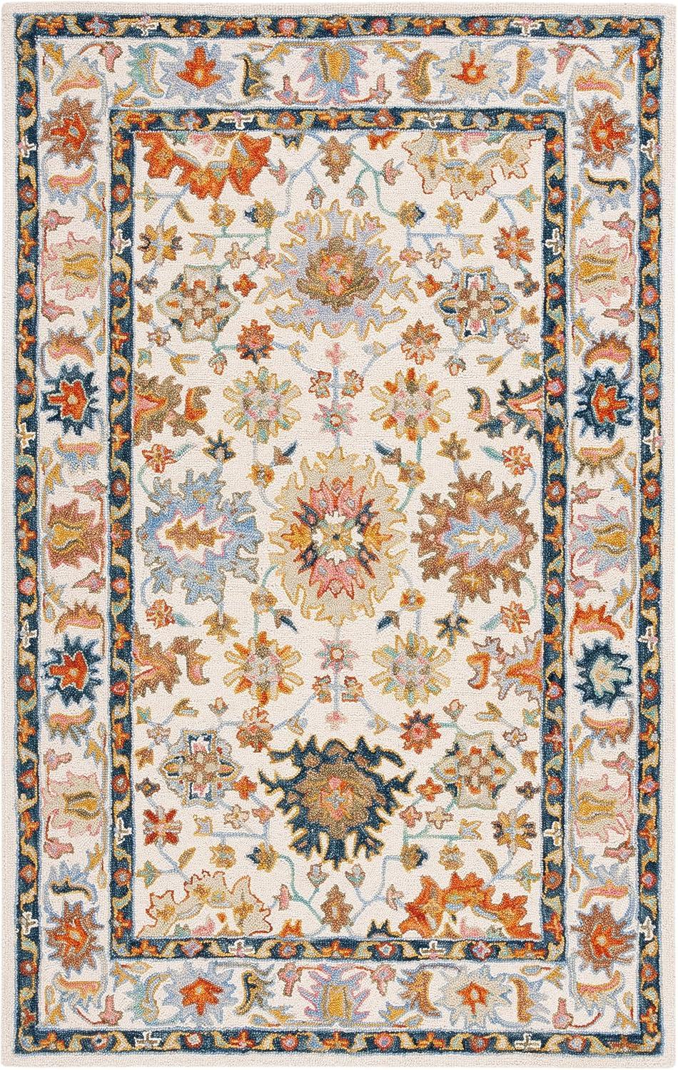 Aspen APN109 Handmade Tufted Area Rug - Ivory/Blue - 6' X 9' - Safavieh