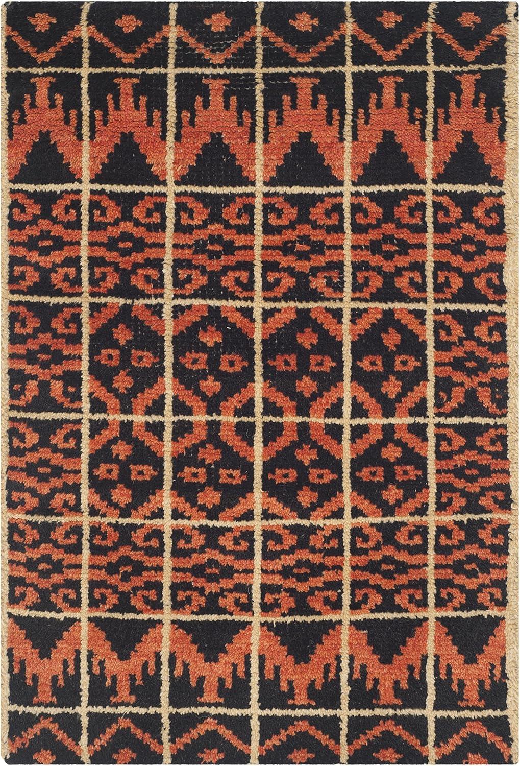 Union Rustic Alimatou Hand Knotted Wool/Cotton Southwestern Rug in Orange/Black