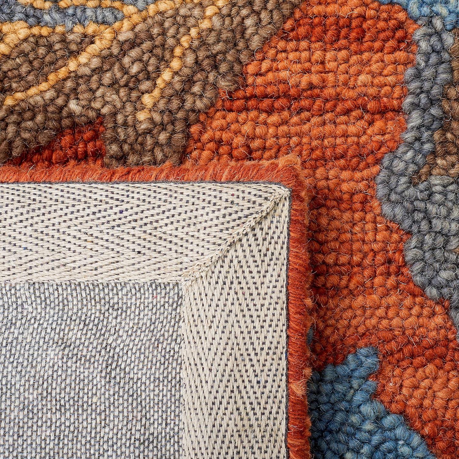 Blossom BLM175 Hand Tufted Area Rug - Rust/Blue - 5'x8' - Safavieh..