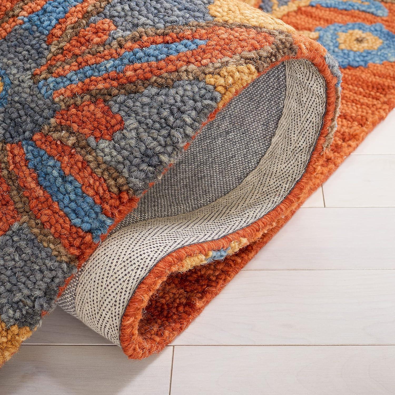 Blossom BLM175 Hand Tufted Area Rug - Rust/Blue - 5'x8' - Safavieh..