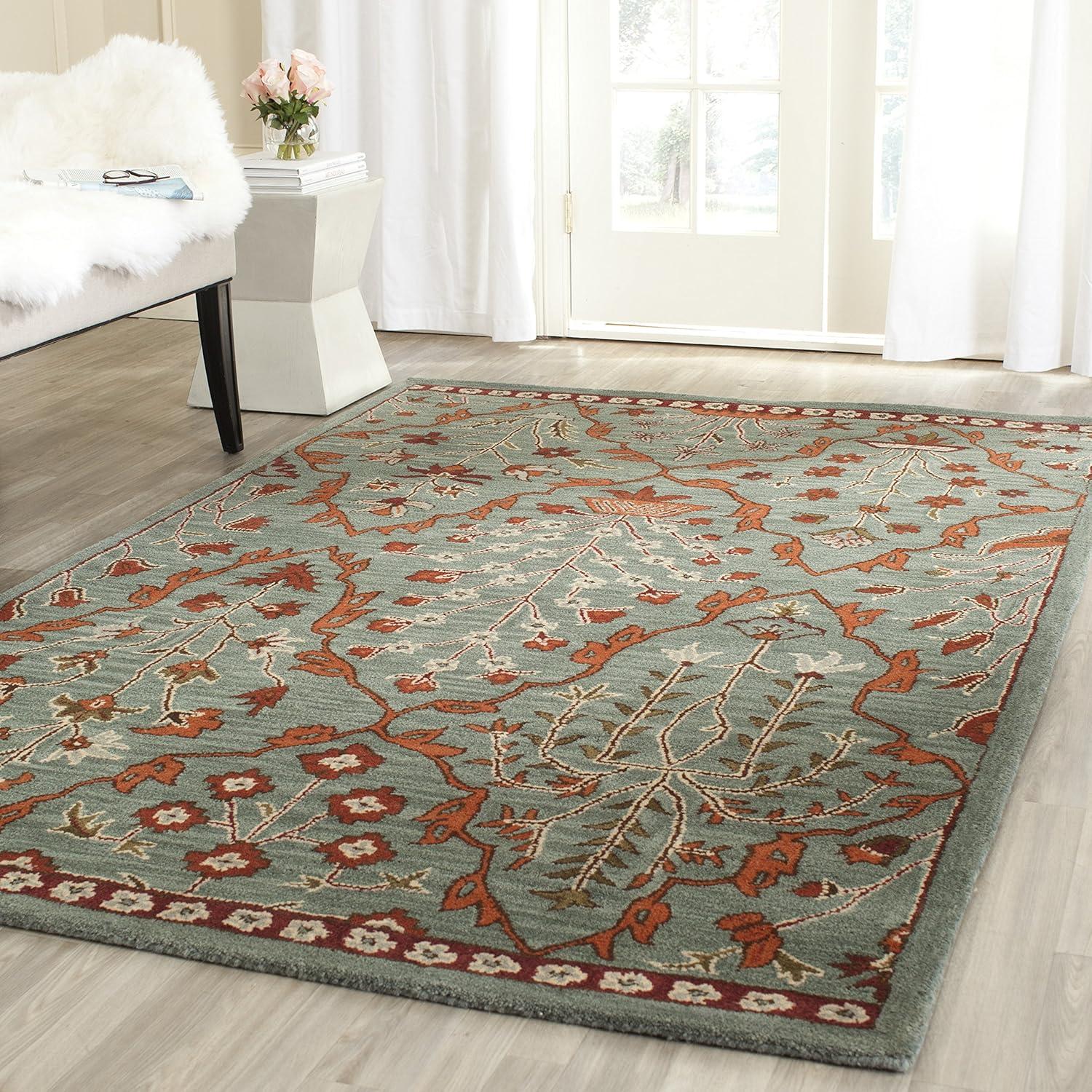 Wyndham WYD206 Hand Tufted Area Rug - Blue/Rust - 5'x8' - Safavieh.