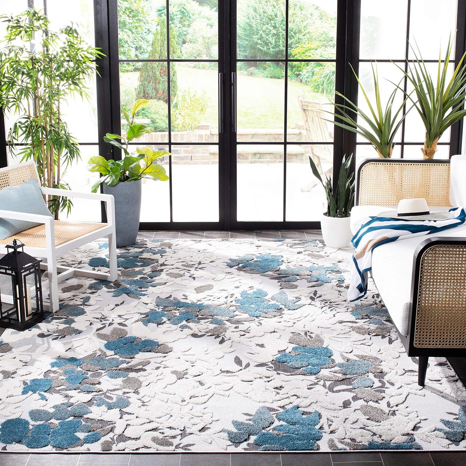 Beige and Blue Floral Synthetic 9' x 12' Area Rug