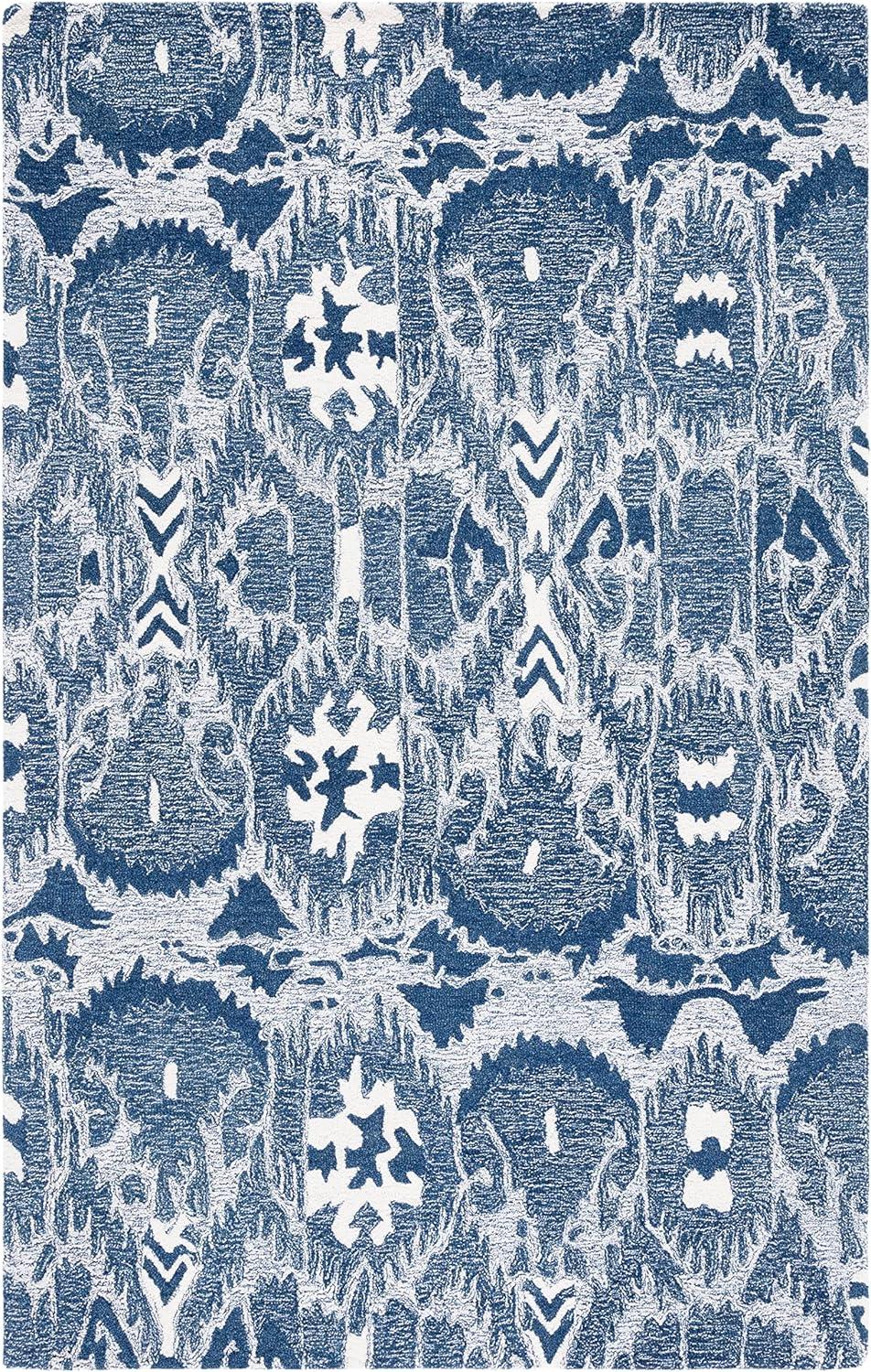 Ikat IKT654 Hand Tufted Area Rug - Blue/Ivory - 8'x10' - Safavieh.