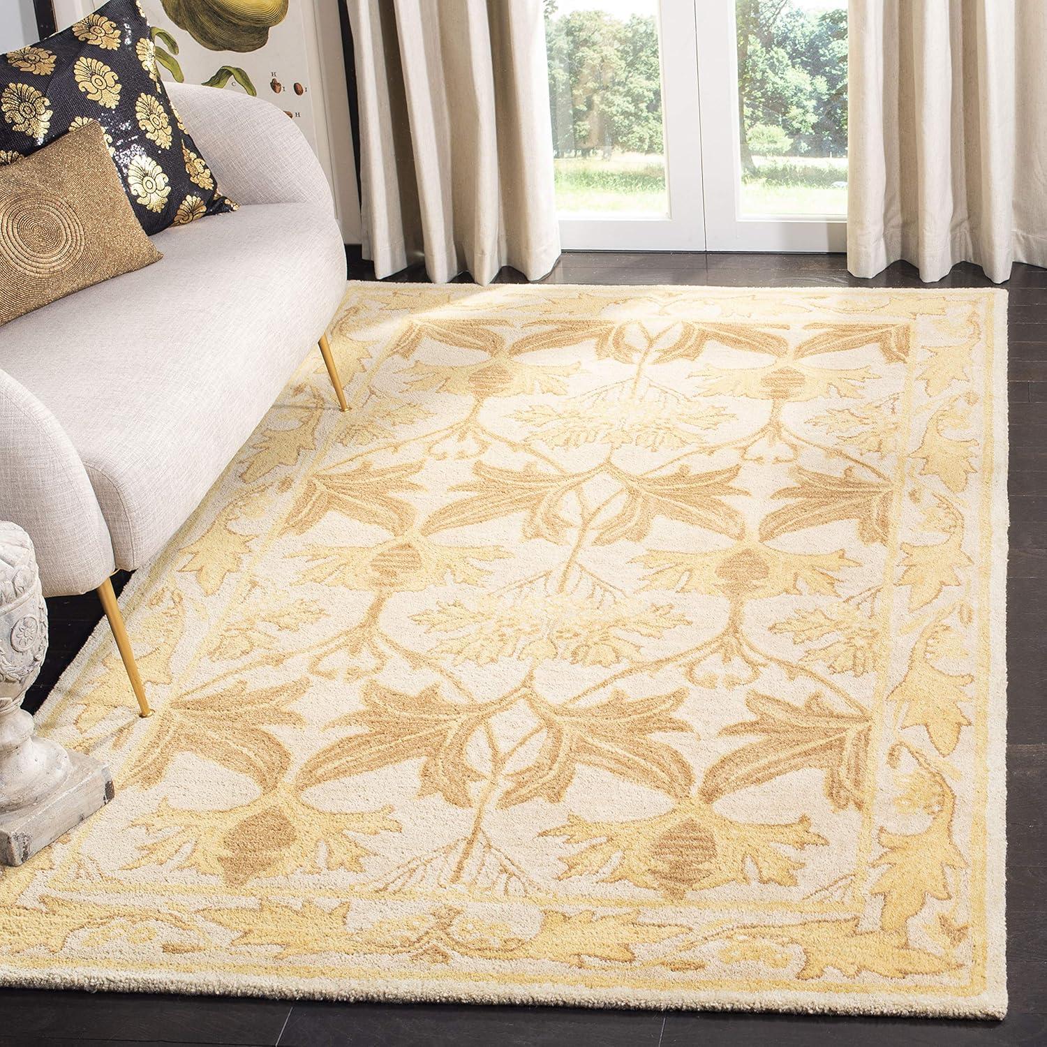 Elegant Ivory and Gold 4' x 6' Hand-Tufted Wool Area Rug