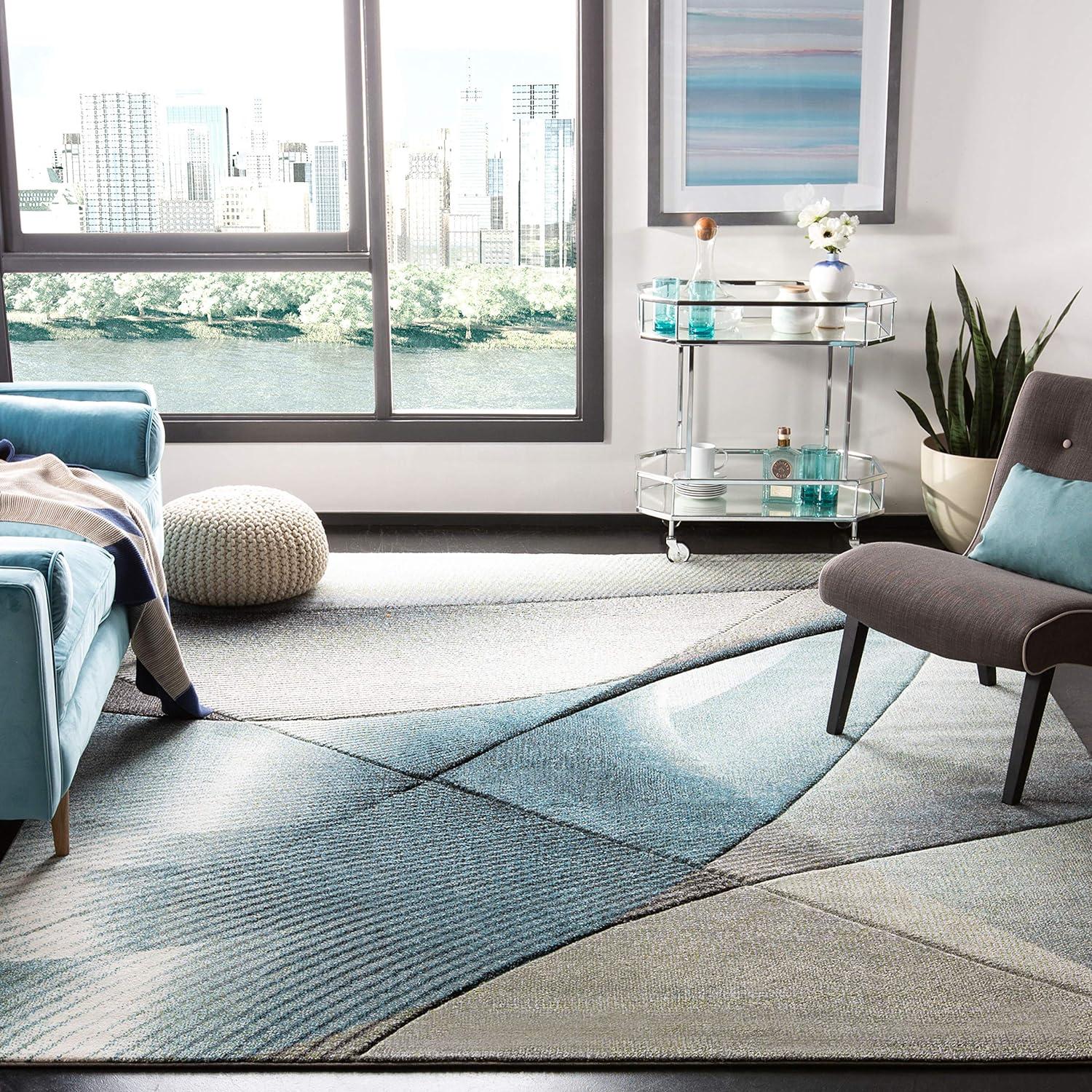 Hollywood HLW715 Machine Made Area Rug - 6'7"x9' - Grey/Teal - Safavieh