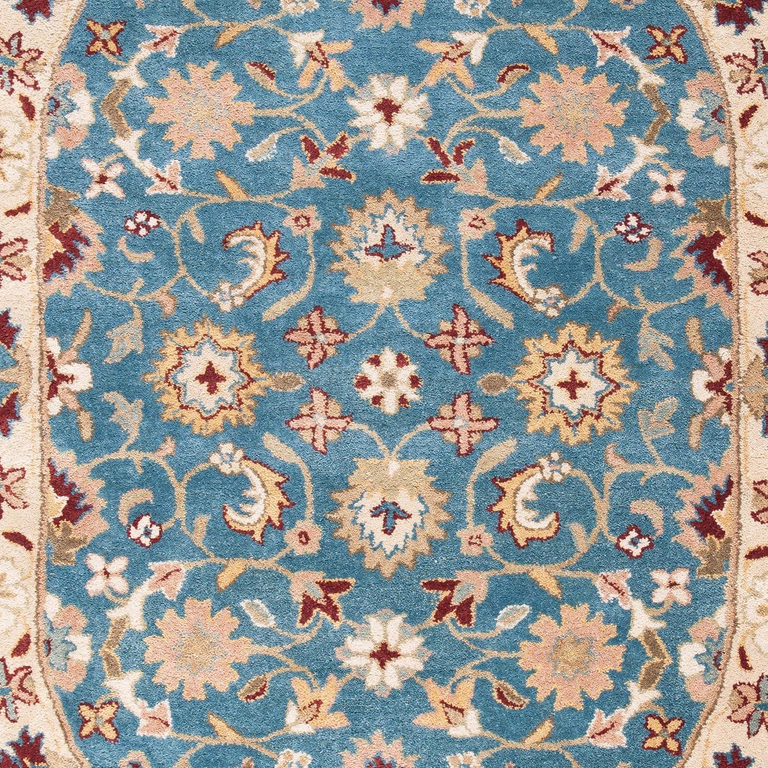 SAFAVIEH Antiquity Anderson Traditional Floral Wool Area Rug, Blue/Beige, 4'6" x 6'6" Oval