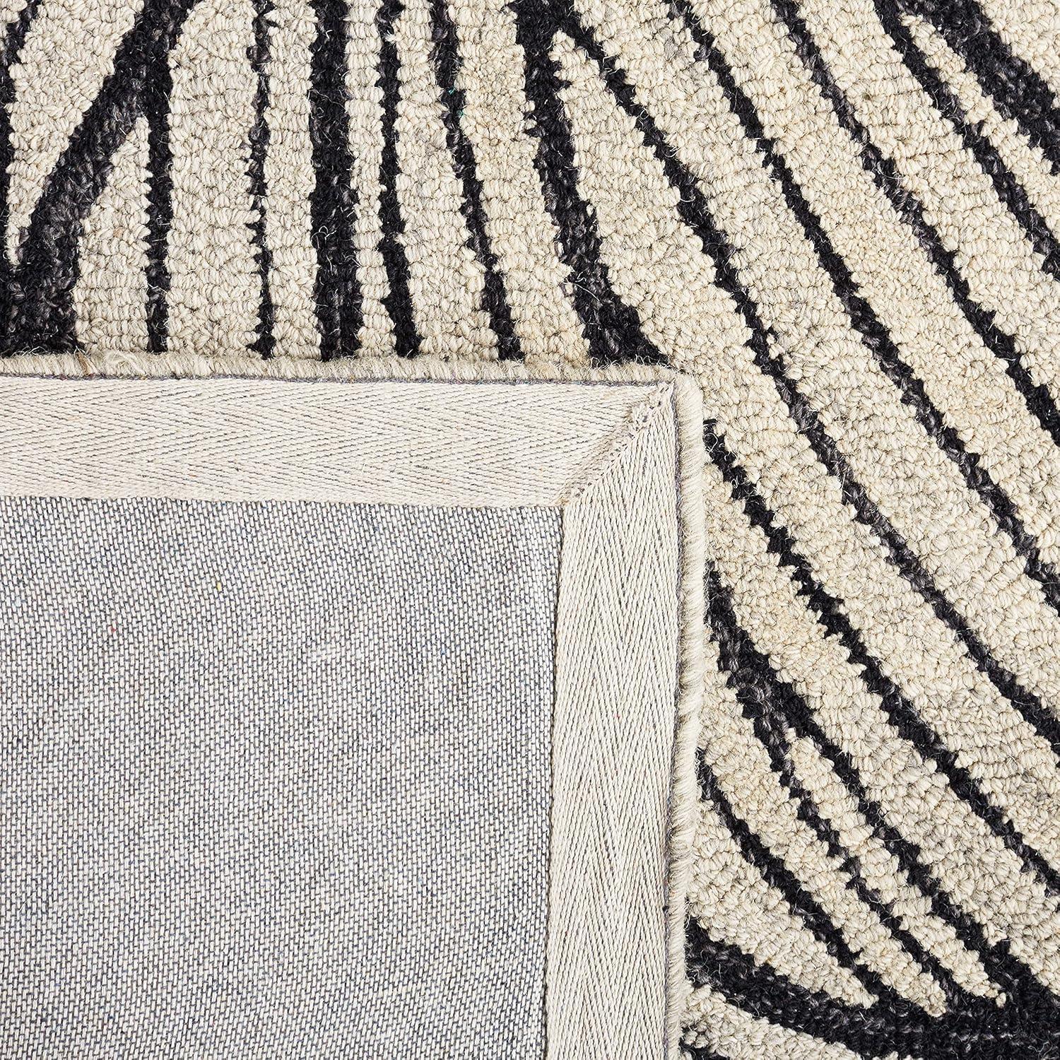 Metro MET451 Hand Tufted Indoor Accent Rug - Black/Ivory - 3'x5' - Safavieh