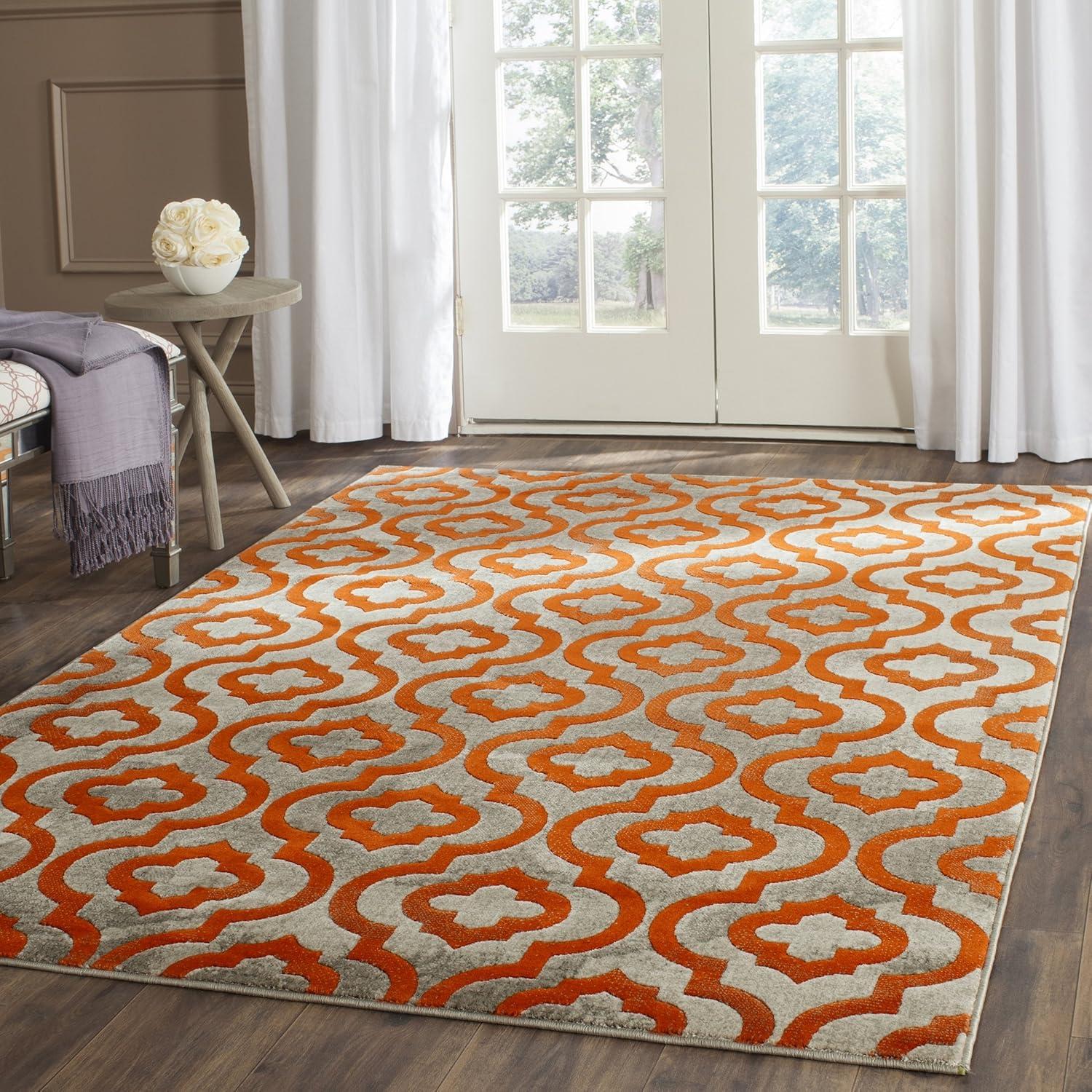 Light Grey and Orange Floral Synthetic Area Rug